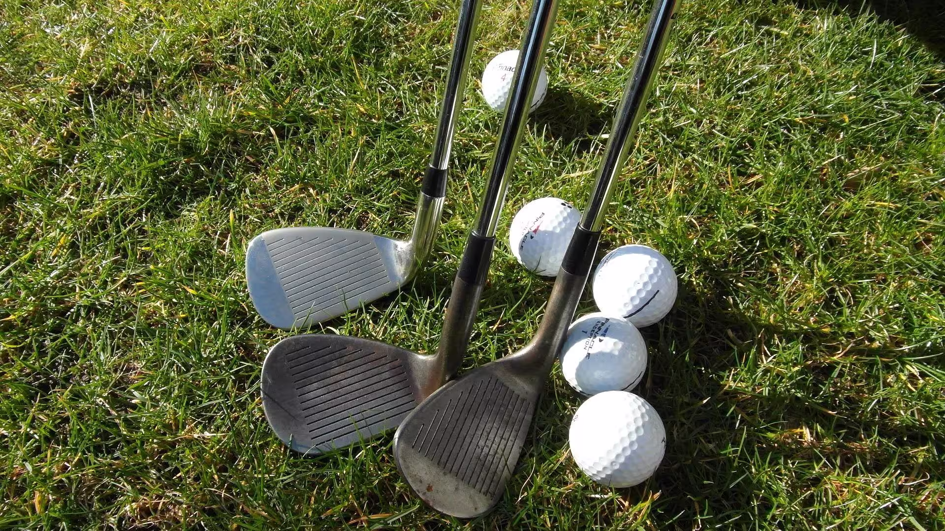 Golfer mid-swing